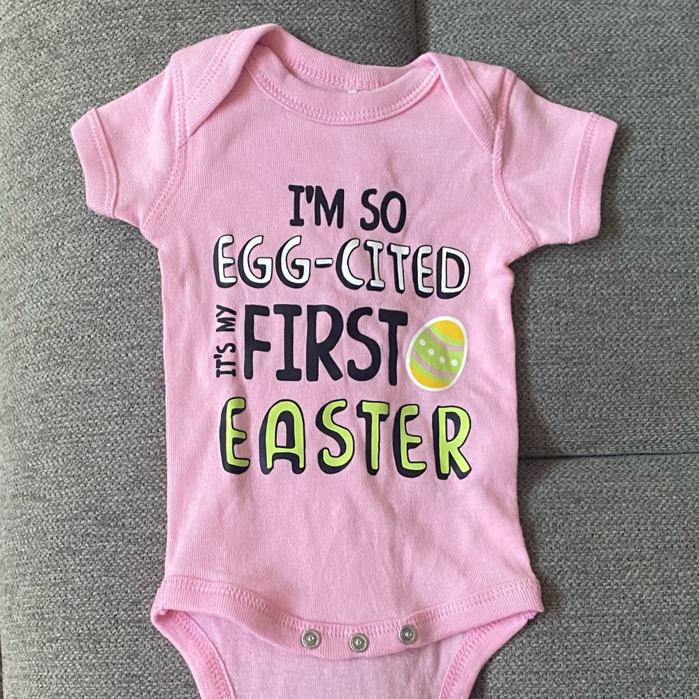 First Easter newborn onesie. Never worn. Pink Easter onesie